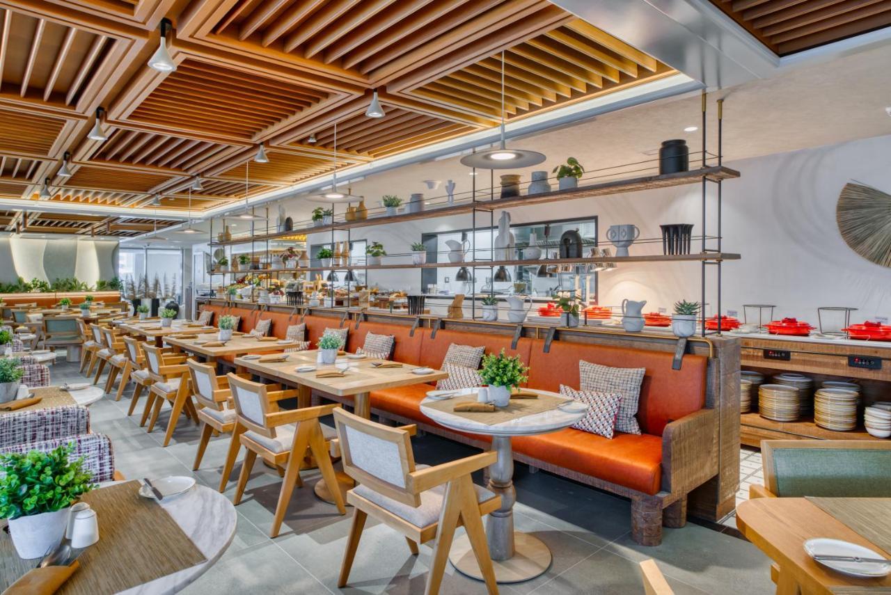ホテル The First Collection Dubai Business Bay エクステリア 写真 Interior of the restaurant